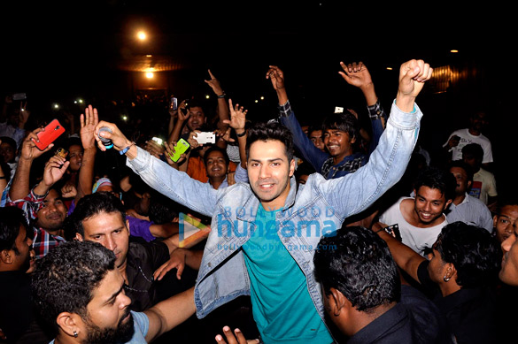 varun dhawan meets his fans at the screening of badlapur at gaiety 4