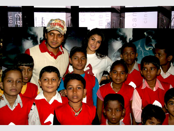 ritesh and jacqueline watch aladin with ngo kids 3