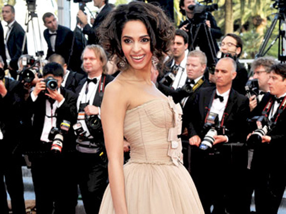 mallika sherawat attends the premiere of wall street money never sleeps held at the palais des festivals during the 63rd annual international cannes film festival 3