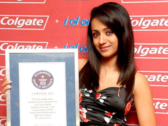 trisha poses with guinness world records certificate for colgate and ida 2