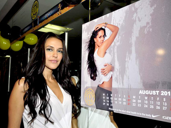 neha dhupia launches golds gym 2011 calendar 5