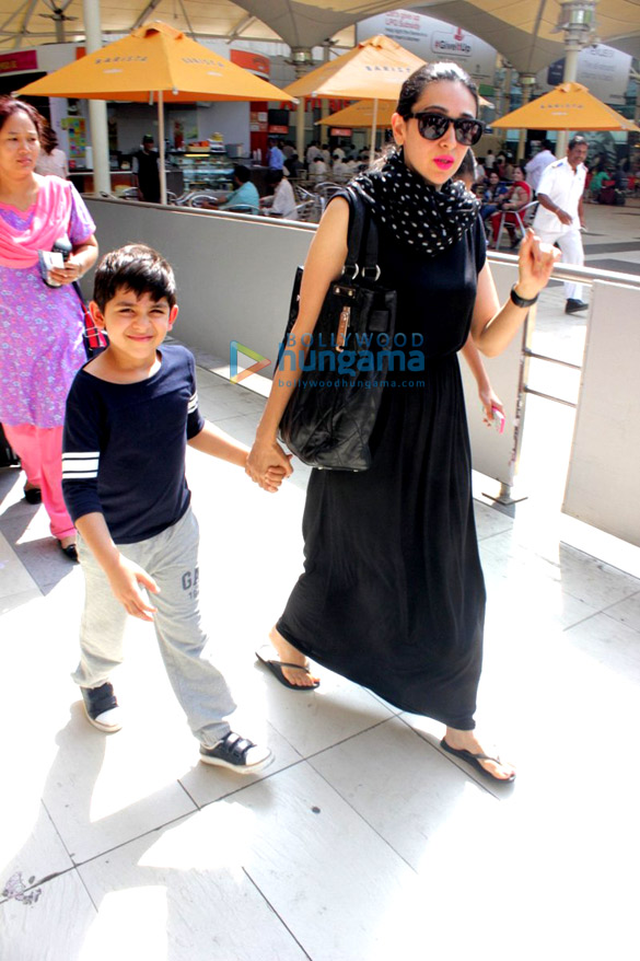 karisma kapoor and kareena kapoor khan return from international childrens film festival in hyderabad 9