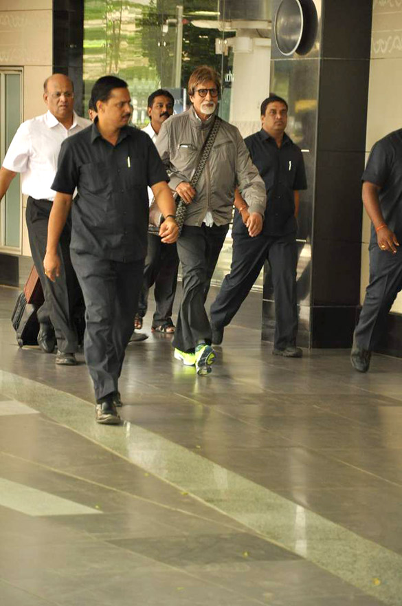big b snapped in green florescent sports shoes 8