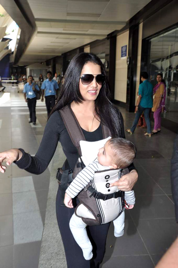 celina snapped with her twins at airport 6