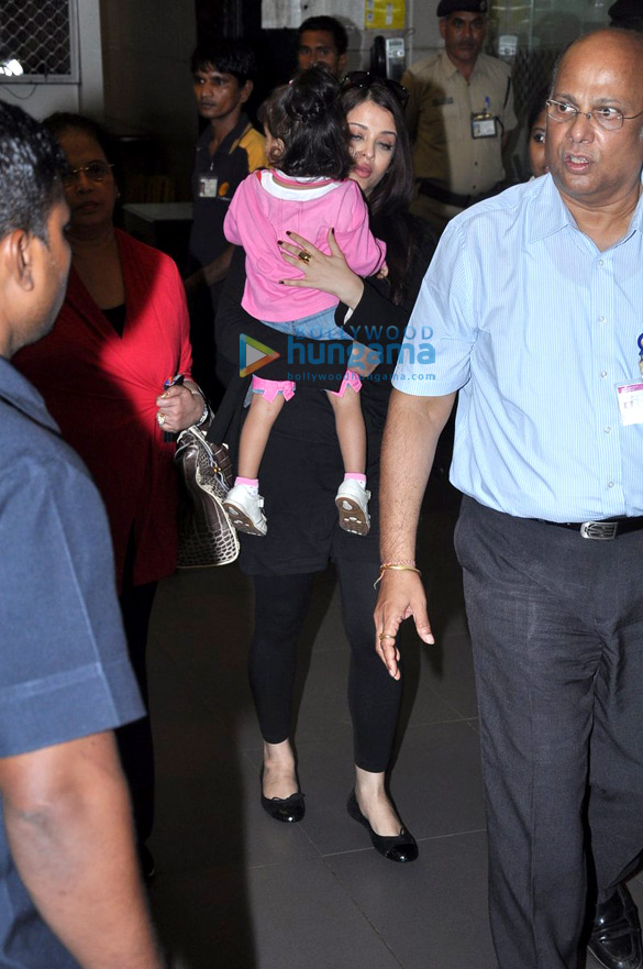 abhishek receives aishwarya as she arrives from london 5