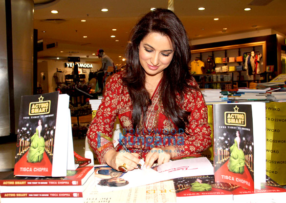 tisca chopra signs her book acting smart for her fans 4