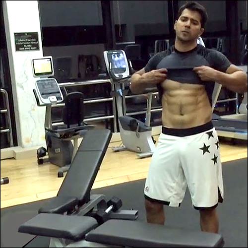 Check out: Varun Dhawan showing off his abs