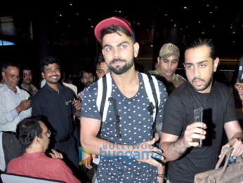 Virat Kohli snapped at the airport arriving from Delhi