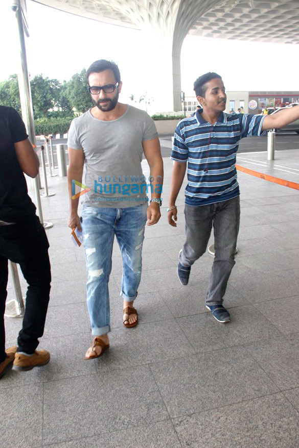 Saif Ali Khan & Shriya Saran snapped at the international airport Saif Ali Khan & Shriya Saran snapped at the international airport