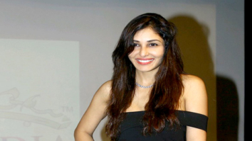 Pooja Chopra walks the ramp at a college’s fashion fest