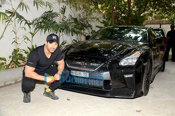 john snapped with his favorite bike and car 1