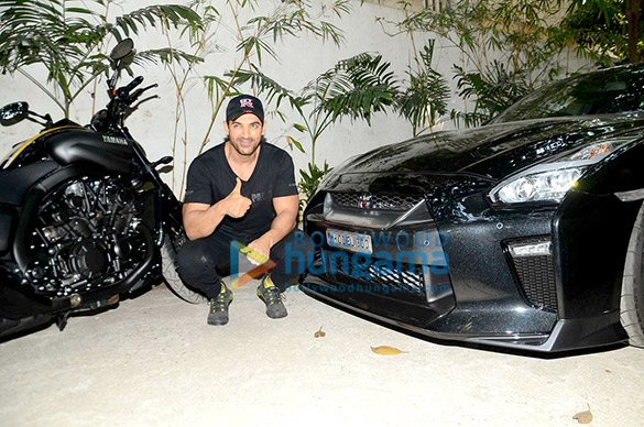 john snapped with his favorite bike and car 2
