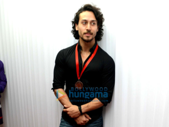 Tiger Shroff along with mother Ayesha and sister Krishna Shroff attend the Super Fight League in Delhi