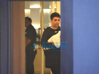 Karan Johar snapped taking his twins Yash & Roohi home