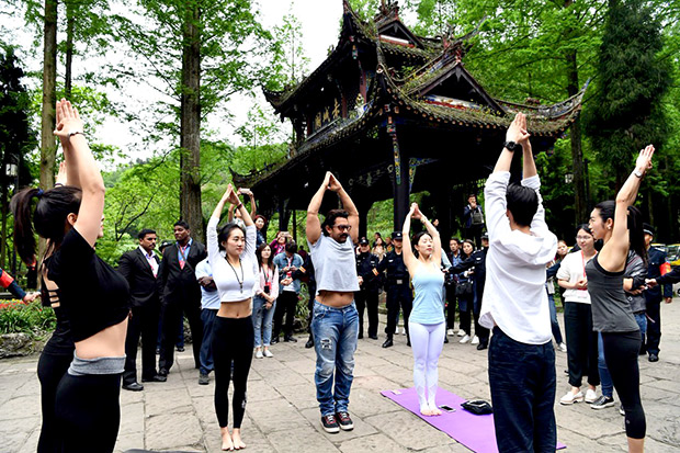 Watch Aamir Khan wrestles with several women during his China visit3