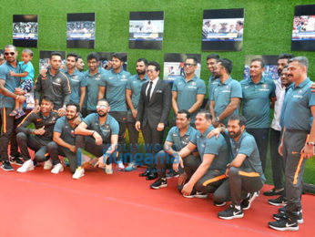 Anushka Sharma and cricketer Virat Kohli pose with Sachin Tendulkar at the premiere of Sachin A Billion Dreams