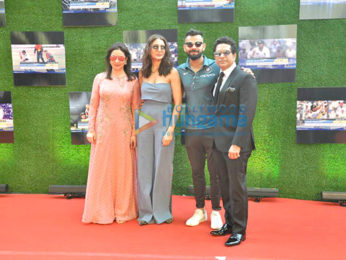 Anushka Sharma and cricketer Virat Kohli pose with Sachin Tendulkar at the premiere of Sachin A Billion Dreams