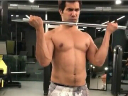 WATCH: Varun Dhawan flaunts his abs as he sweats it out in gym