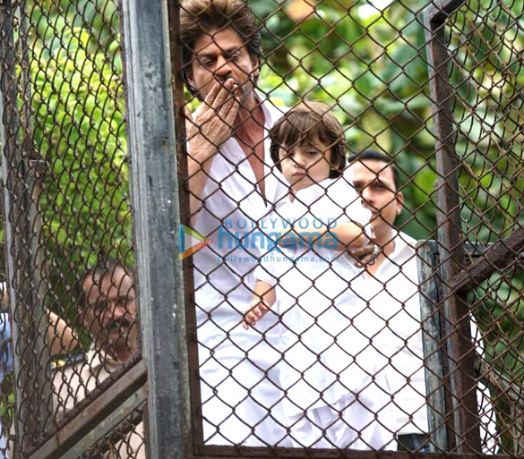 shah rukh khan and his abram khan snapped at their house mannat on eid today 2