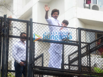 Shah Rukh Khan and his AbRam Khan snapped at their house Mannat on Eid today