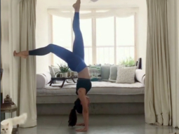 OMG! Flexible hottie Jacqueline Fernandez walks upside down in this cool video!
