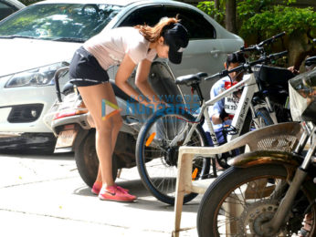 Rhea Chakraborty snapped riding a cycle to her gym