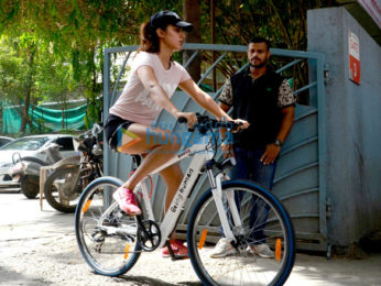 Rhea Chakraborty snapped riding a cycle to her gym