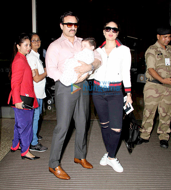 Saif Ali Khan and Kareena Kapoor Khan pose with Taimur as they depart for Switzerland Saif Ali Khan and Kareena Kapoor Khan pose with Taimur as they depart for Switzerland