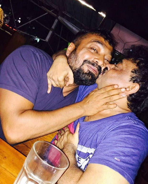 WTF! Ram Gopal Varma And Anurag Kashyap go a KISSING SPREE in a public place