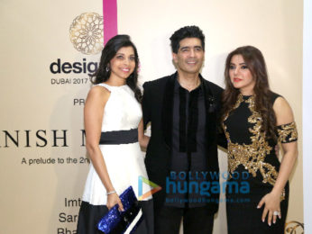 Sidharth Malhotra, Kriti Sanon and Karan Johar walk the ramp for Manish Malhotra's Design One show in Dubai