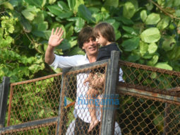 Shah Rukh Khan and Abram snapped waving and wishing fans Eid Mubarak at Mannat