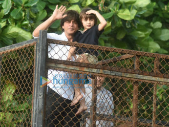 Shah Rukh Khan and Abram snapped waving and wishing fans Eid Mubarak at Mannat