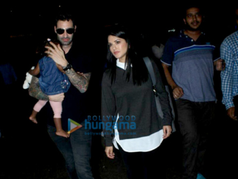 Sunny Leone, Daniel Weber snapped with kid Nisha Kaur Weber at the airport