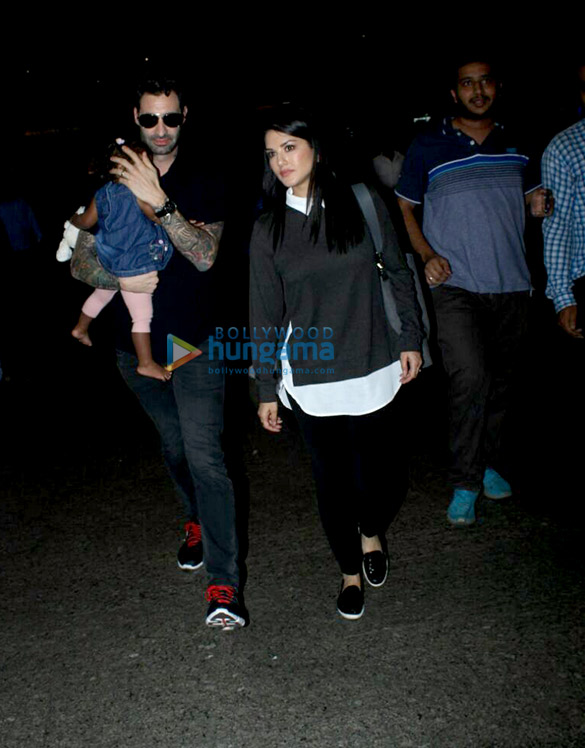 Sunny Leone, Daniel Weber snapped with baby Nisha Kaur Weber at the airport