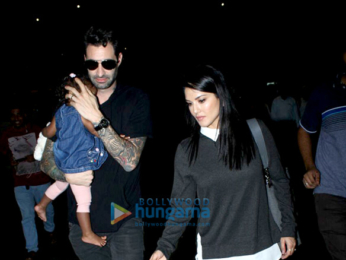 Sunny Leone, Daniel Weber snapped with kid Nisha Kaur Weber at the airport