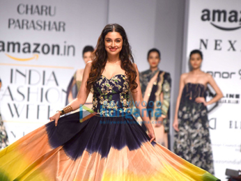 Divya Khosla Kumar walks the ramp for designer Charu Parashar at the Amazon India Fashion Week