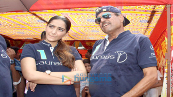 Sonam Kapoor and Kapil Dev at an event held by Magic Bus in Dharavi