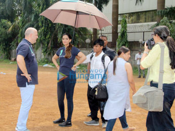 Sonam Kapoor and Kapil Dev at an event held by Magic Bus in Dharavi