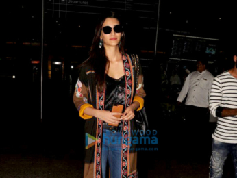 Kriti Sanon, Kajal Agarwal and Karan Johar snapped at the airport