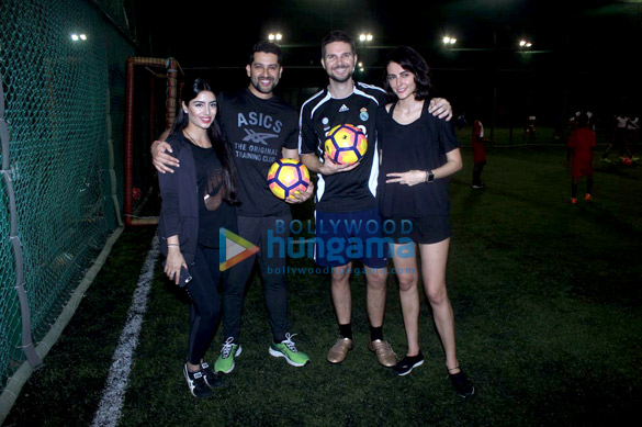 mandana karimi snapped with her football team 1