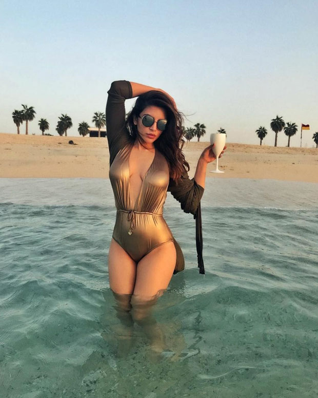Shama Sikander sizzles in golden swimwear in Dubai