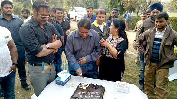 ajay devgn celebrates producer kumar mangat pathaks birthday on the sets of raid 2