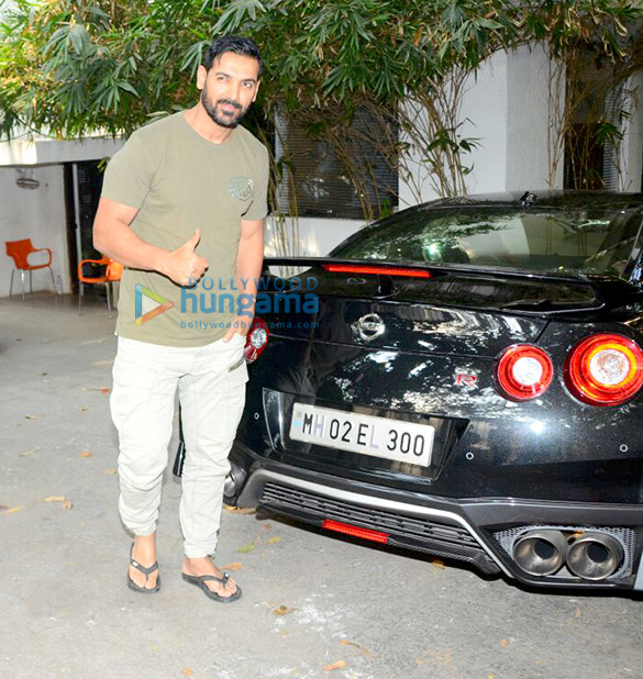 john abraham spotted with his sports car and bike 2