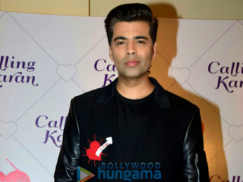Karan Johar snapped at press meet for Ishq FM