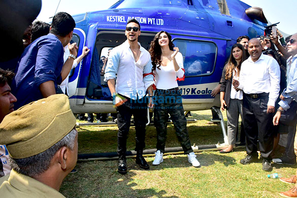 tiger shroff and disha patani arrive in a helicopter for the trailer launch of baaghi 2 5 2