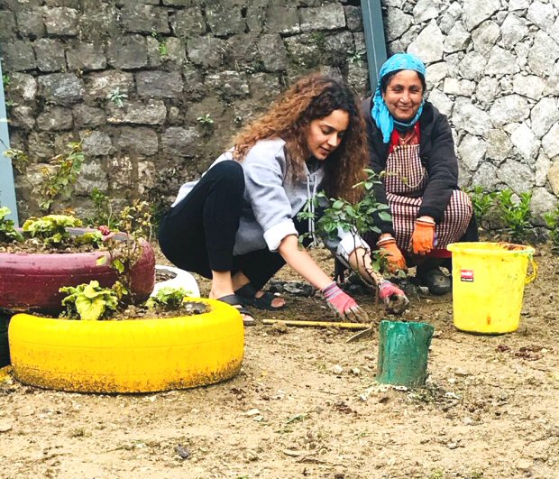 Just recently we had reported that Kangana Ranaut had bought herself a new bungalow in Manali. In fact, we had also shared an image of a pooja being done that featured Kangana and her family. Well today, Kangana Ranaut turns a year older and to mark this special occasion the actress decided to do something that not only benefits the environment but will also serve as memory for years to come. Marking this special day Kangana Ranaut decided on planting 31 saplings in the yard of her new bungalow in Manali. Taking to the micro blogging website, Kangana’s sister Rangoli shared an image of the actress getting her hands dirty in the mud while planting the saplings. Posting the image Rangoli added, “On her b’day our little Queen gifts herself a greener planet ...May you live long and live a beautiful life .. #HappyBirthdayKanganaRanaut”. While we must admit that this sure is a way to pay it forward on your special day, back on the work front Kangana Ranaut who was last seen in Simran has her hands full. She is currently shooting for the ambitious film Manikarinka – The Queen of Jhansi. And soon, she will commence work on her next venture Mental Hai Kya with Rajkummar Rao. Besides these two, the actress is also supposed to do a film with Shekhar Kapur in which she plays the role of an 85-year-old woman. 