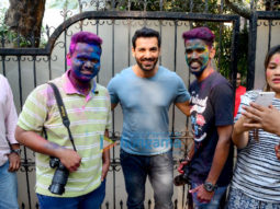 John Abraham celebrates Holi with photographers in Bandra