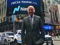Anupam Kher rings the Nasdaq bell at Times Square during New Amsterdam promotions!