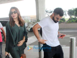Anushka Sharma, Virat Kohli and Sanjay Kapoor snapped at the airport