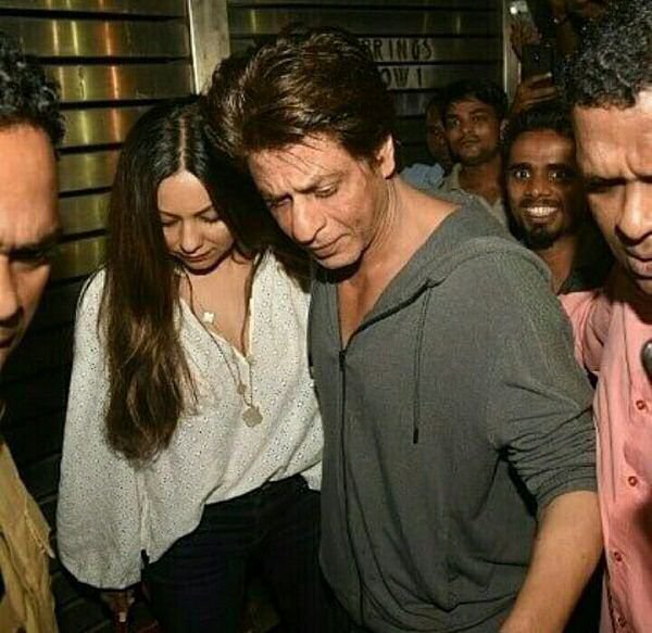 Shah Rukh Khan protecting Gauri from the paps personifies their TIMELESS ROMANCE